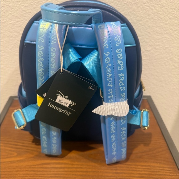 NWT Disney Atlantis: The Lost Empire Kida Glow Loungefly Mini Backpack